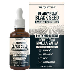 Triquetra Health black seed oil bottle being poured for daily wellness
