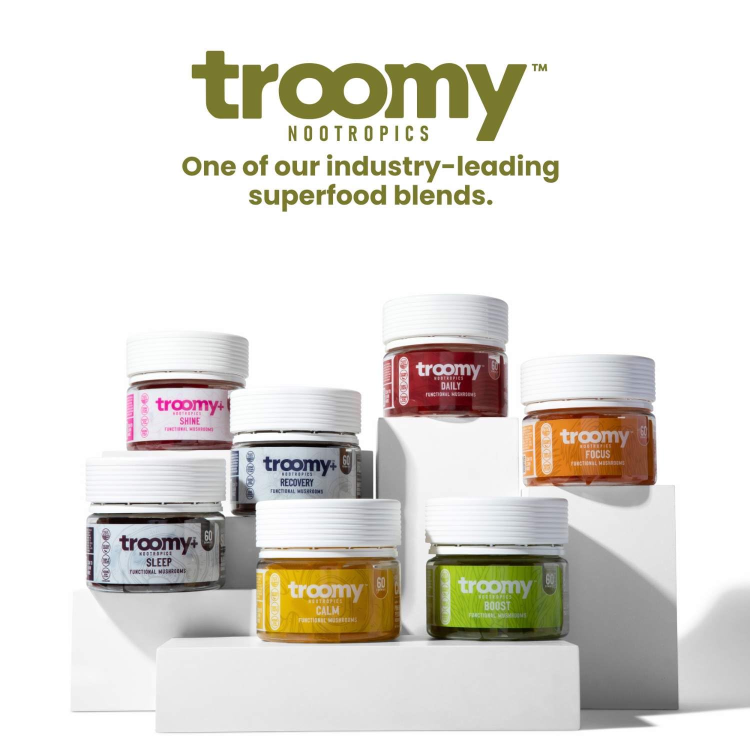 Troomy Boost gummies in hand demonstrate easy, tasty wellness on the go