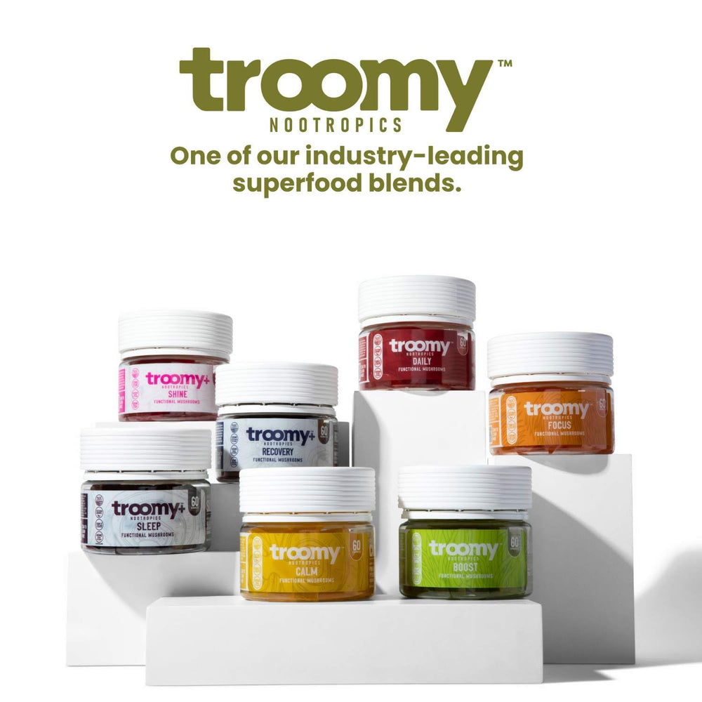 Troomy Boost gummies in hand demonstrate easy, tasty wellness on the go