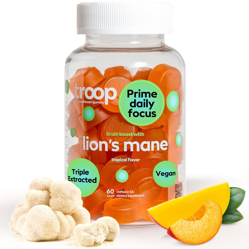 Troop Lion's Mane Gummies bottle on table for easy daily focus support.