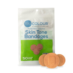 Tru-Colour olive skin-tone spot bandages on skin for discreet protection