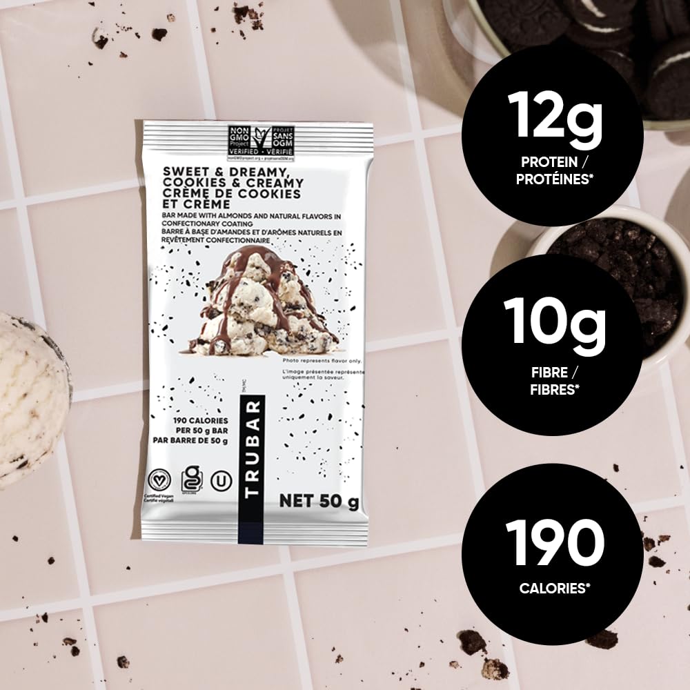 TRUBAR vegan protein bar close-up, glossy chocolate coating and chewy center.