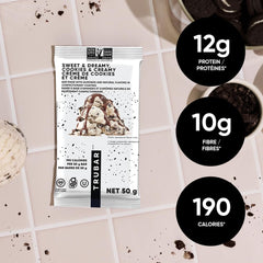 TRUBAR vegan protein bar close-up, glossy chocolate coating and chewy center.