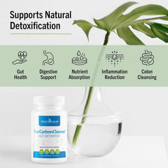 TrueCarbonCleanse capsules closeup highlights activated charcoal texture.