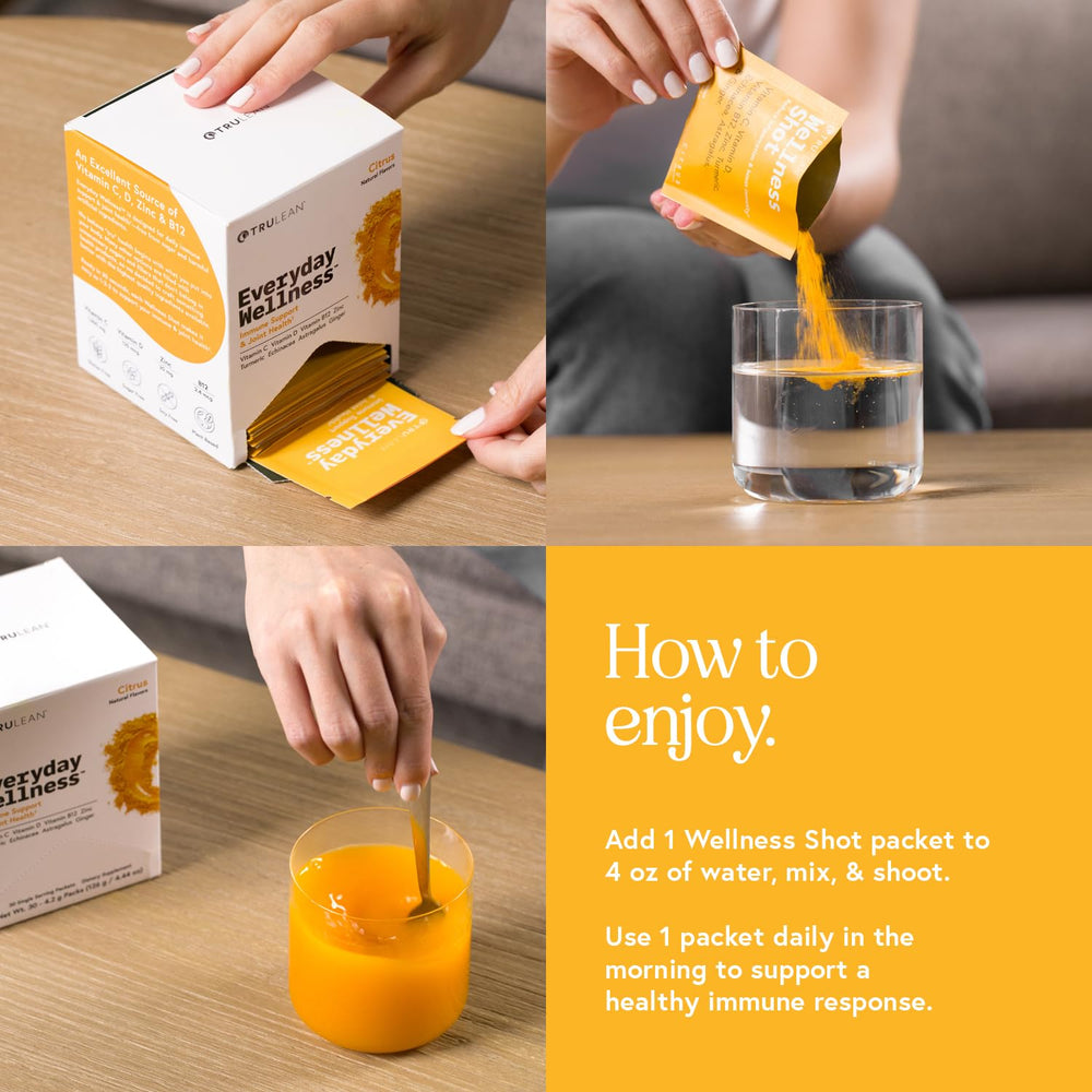 TRULEAN Everyday Wellness Shot glass shows a bright citrus mix ready for daily use