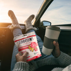 Tummy Drops strawberry-ginger lozenges closeup, smooth texture and natural sweetness.