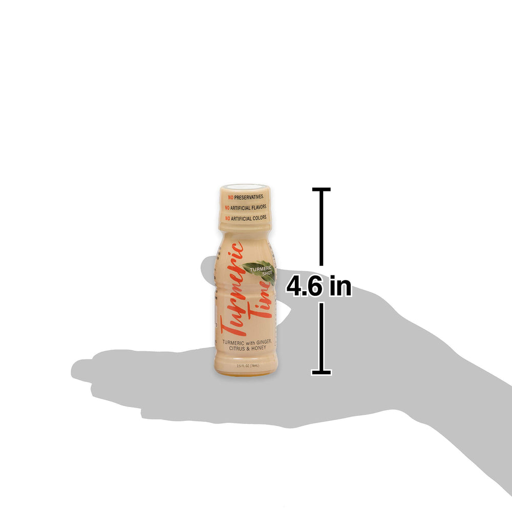 Turmeric Time serving glass shot displays ready-to-drink format.
