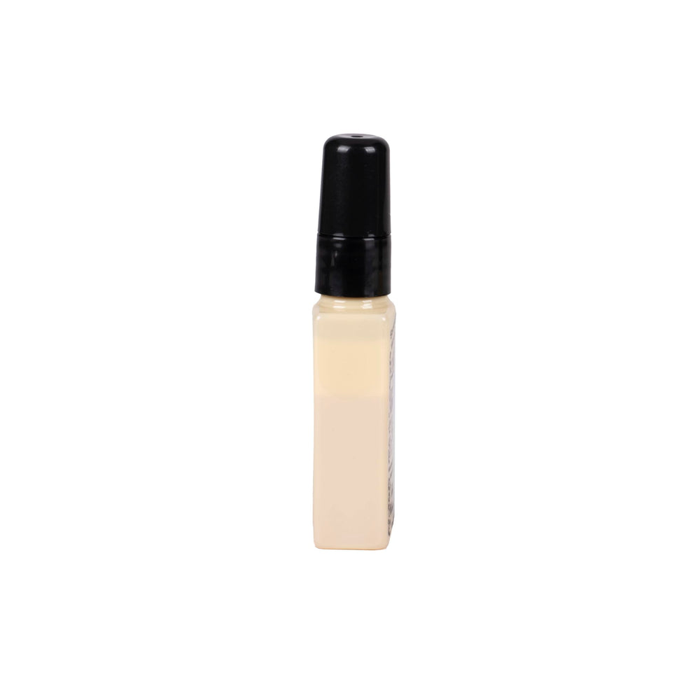 TYLER High Maintenance spray in action with quick bursts for fragrance.