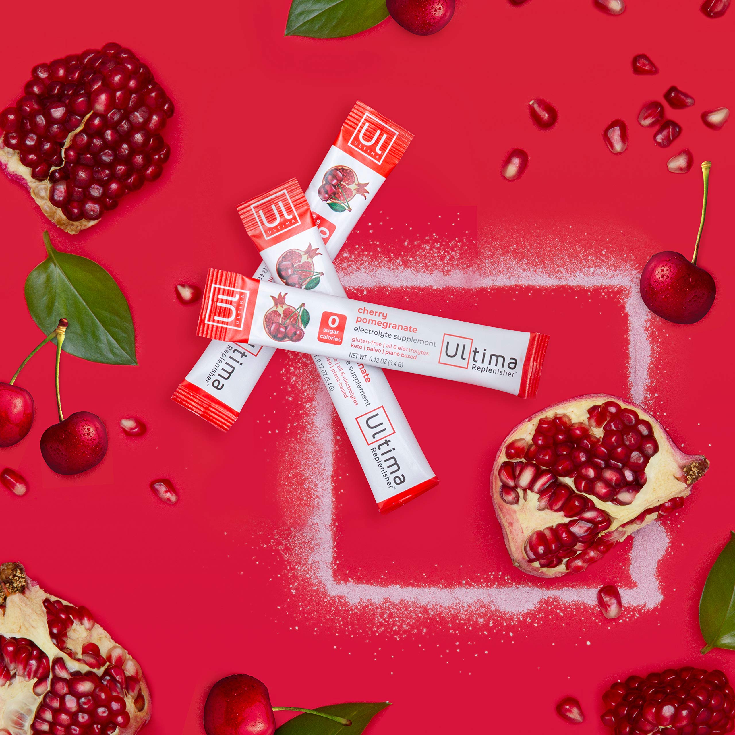 Powder dissolving in water with vibrant Cherry Pomegranate flavor.