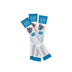 Ultima Replenisher in water glass with stickpack, refreshing electrolyte sip