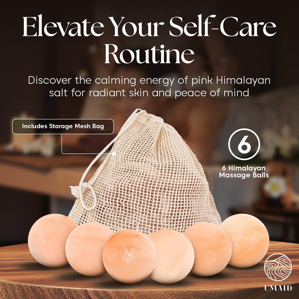 Hands holding a UMAID massage ball for gliding on skin