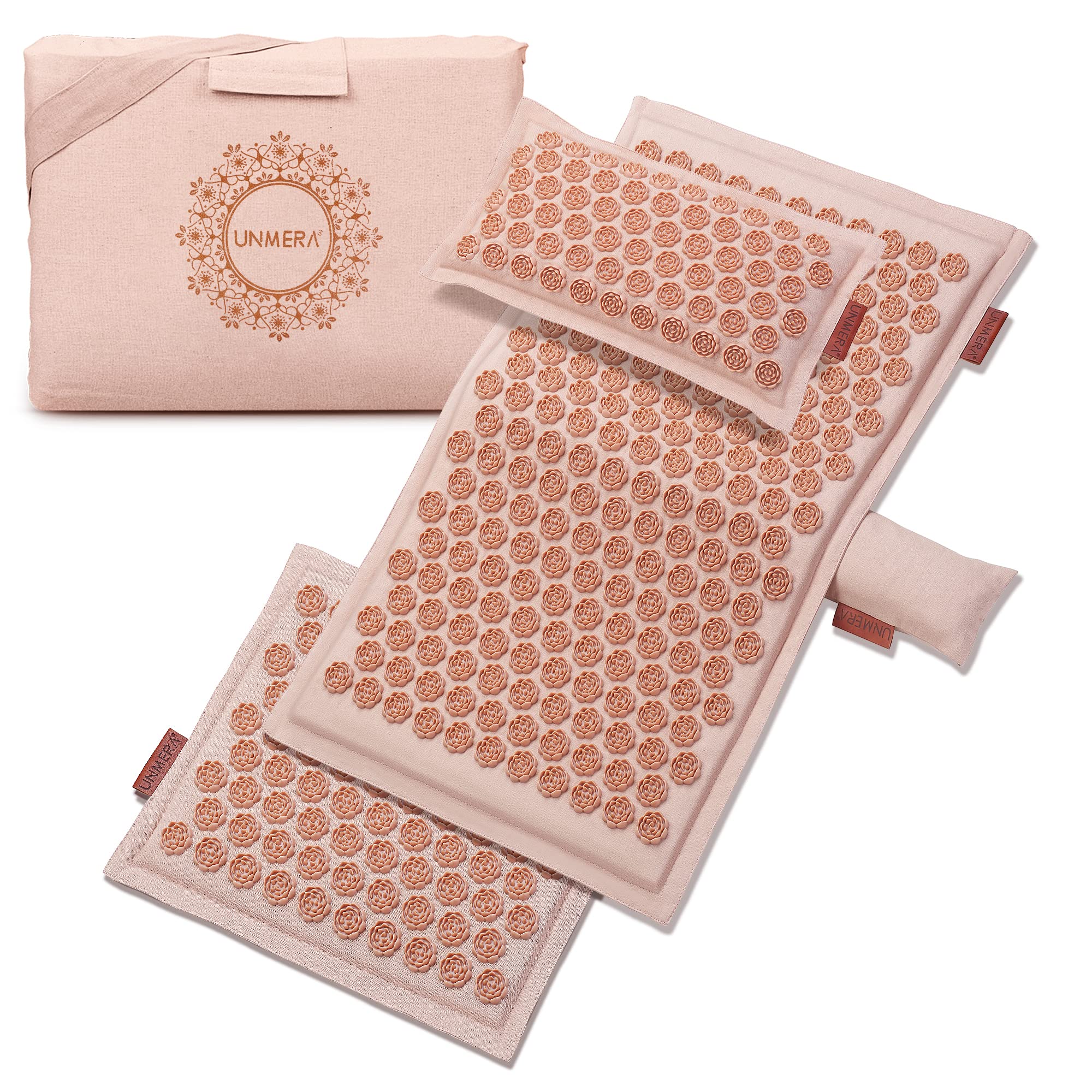 UNMERA acupressure mat camellia spikes close-up for targeted back relief.