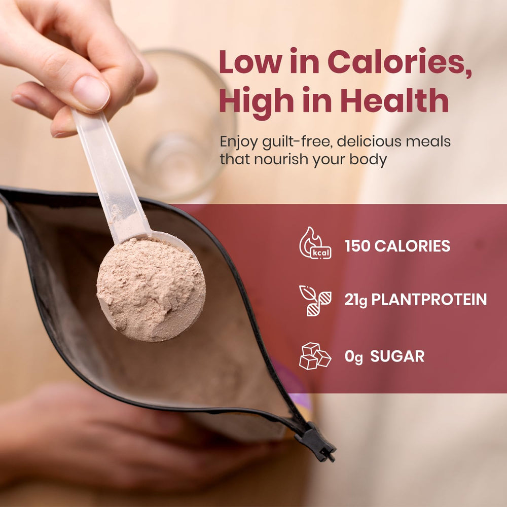 Glass of strawberry banana protein shake made with UpNourish vegan powder