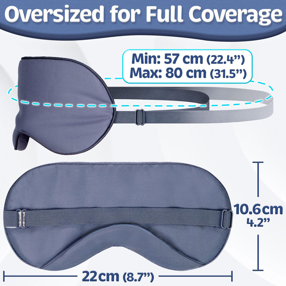 Vegan Silk sleep mask navy gray in dark bedroom for night use.