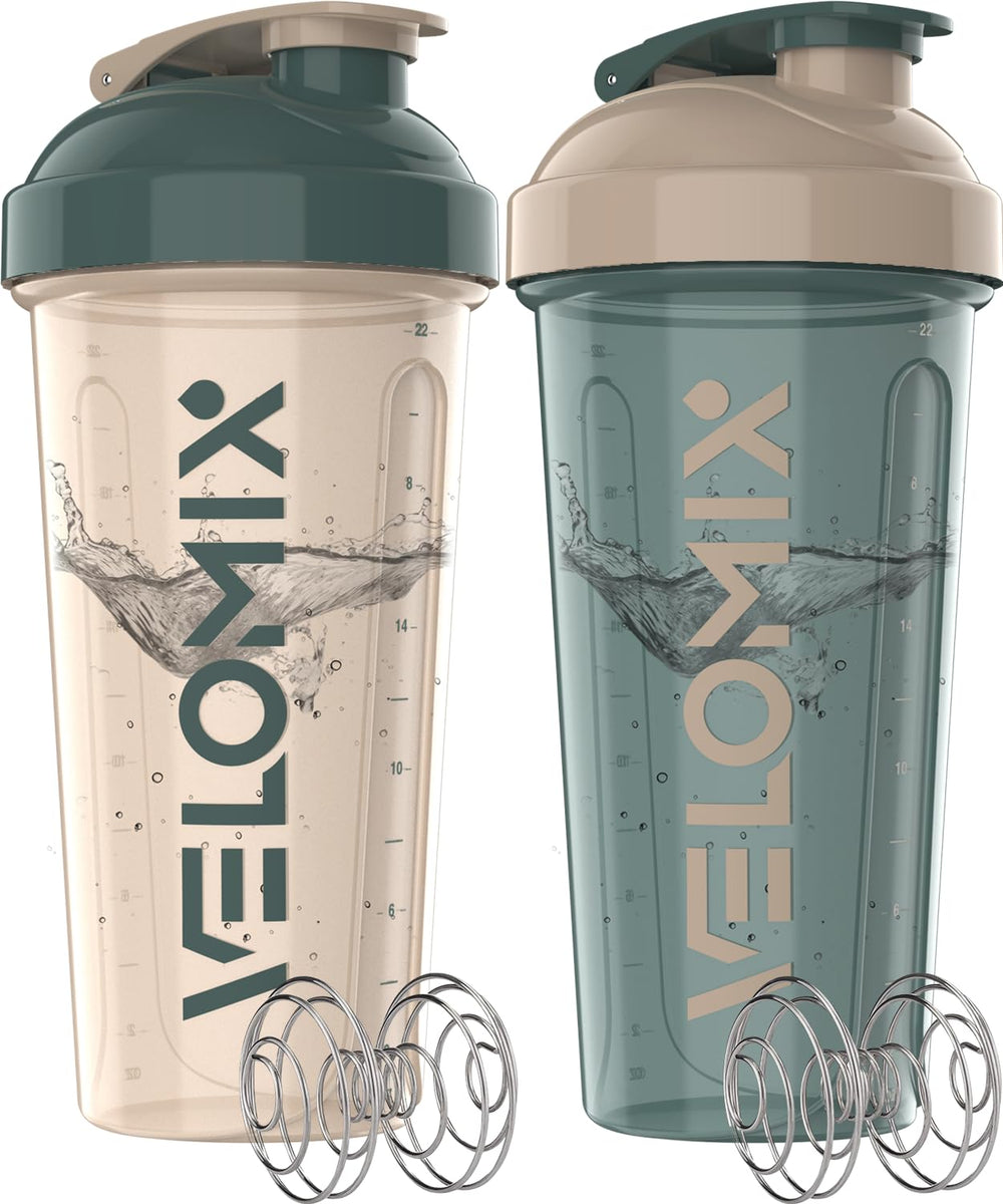 VELOMIX two-pack 28 oz shaker bottles in blue and beige for convenient protein mixing.