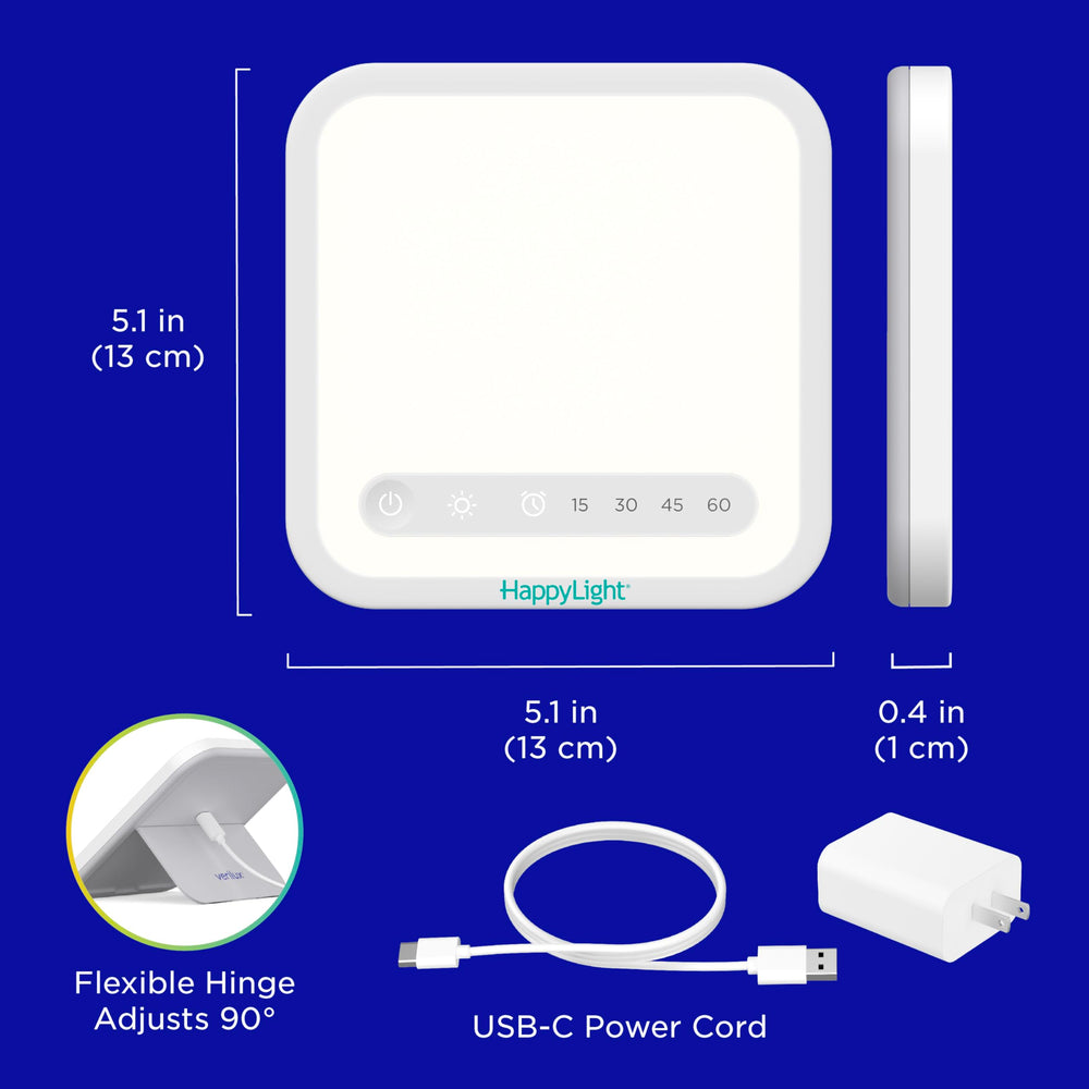 Verilux HappyLight Mini desk-use setup providing daytime energy at work