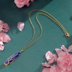 VIBILIA lapis lazuli crystal point pendant promotes insight and serene mood.