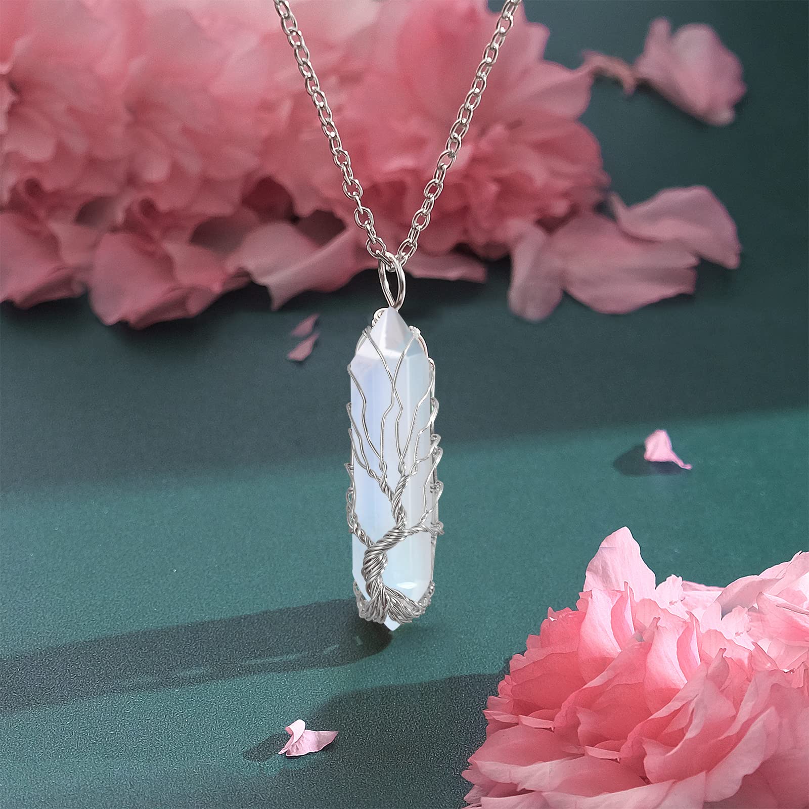Silver-tone wire-wrapped crystal pendant ready for everyday wear.