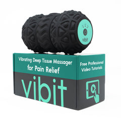 Vibit vibrating massager in hand for on-the-go relief and muscle recovery.
