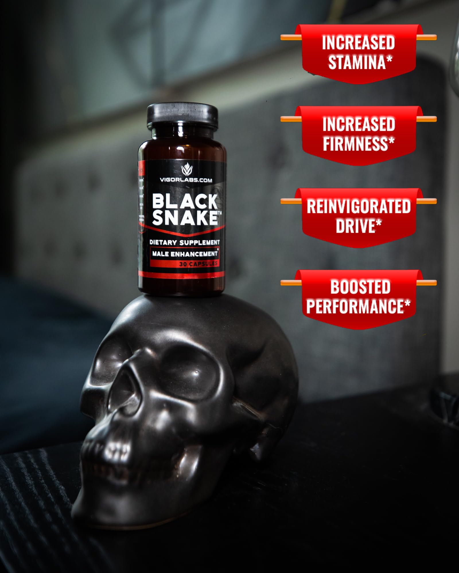 Glass of water beside Black Snake capsules supports daily ritual.