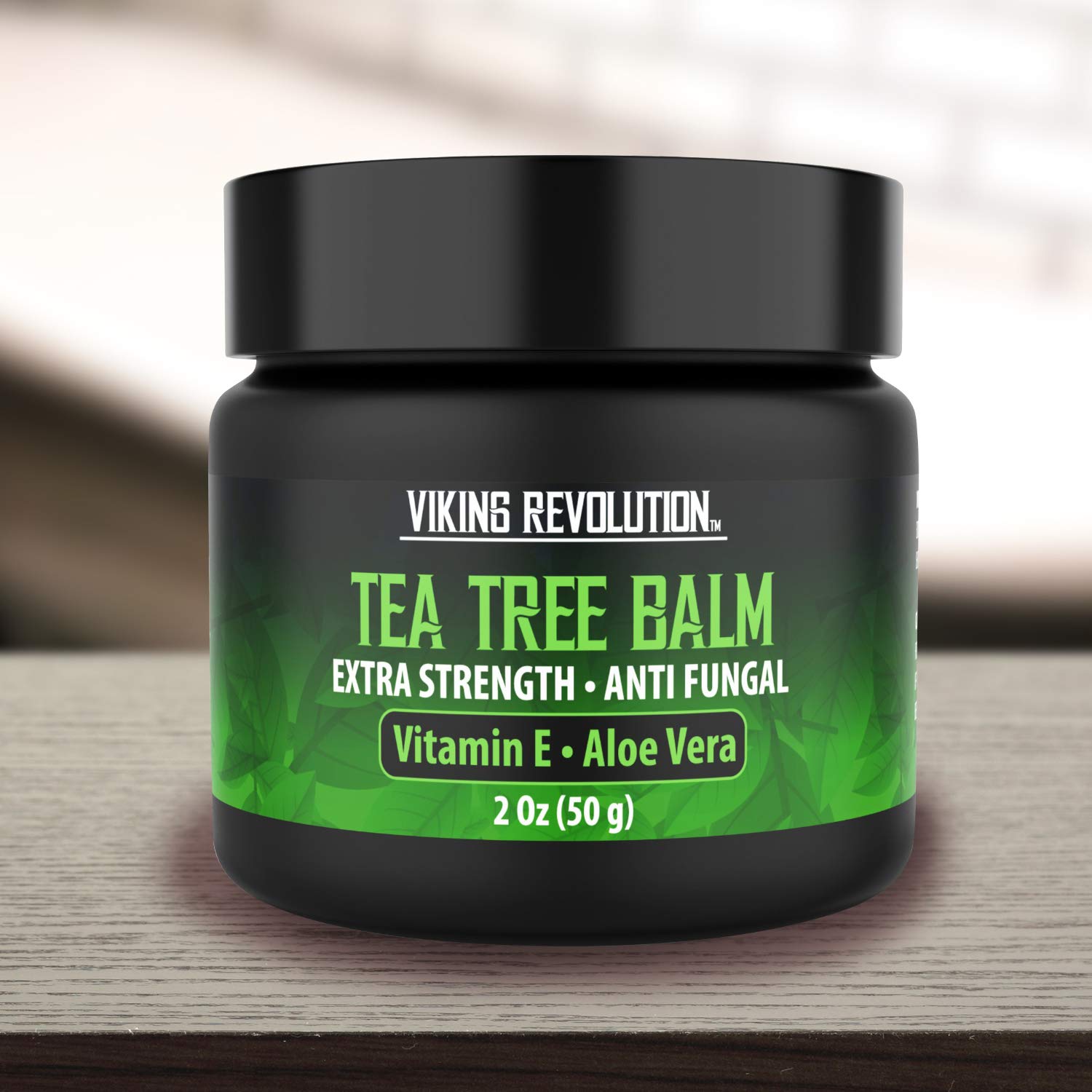 Applying Viking Revolution Tea Tree Oil Cream to skin for soothing relief
