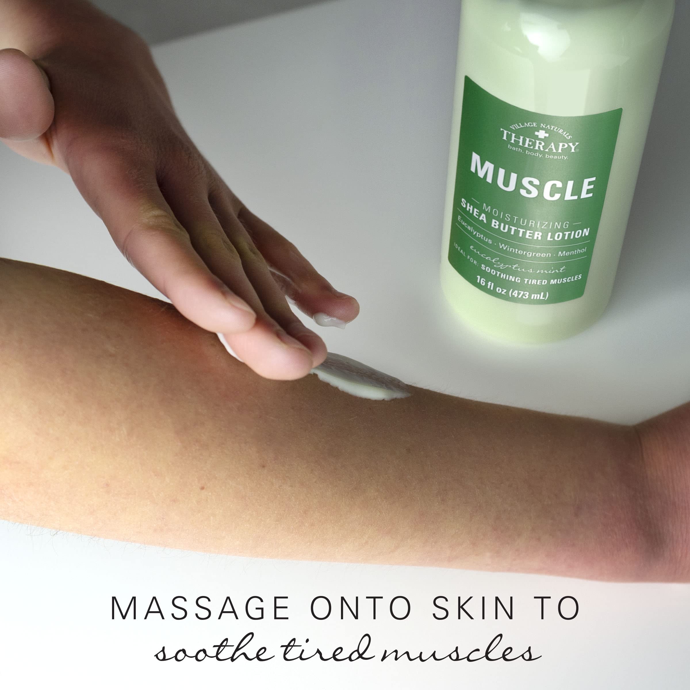 Village Naturals Therapy Muscle Shea Butter Lotion massaged onto forearm