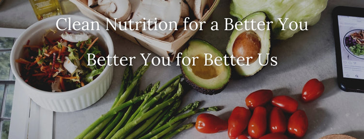 Healthy food items like salad, tomatoes, and asparagus with a phone displaying a meal app on a light background.