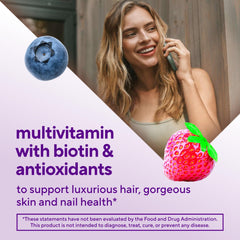 Biotin-enriched formulation shown in glass with gummies, suggesting beauty-forward potential