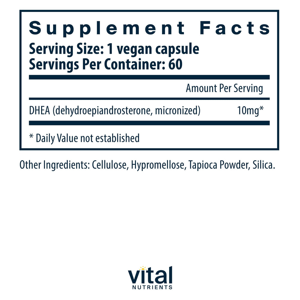Closeup of Vital Nutrients DHEA capsules highlighting vegan formula