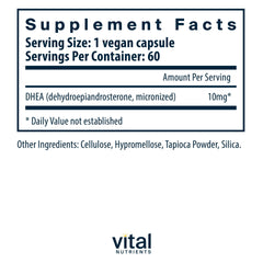 Closeup of Vital Nutrients DHEA capsules highlighting vegan formula