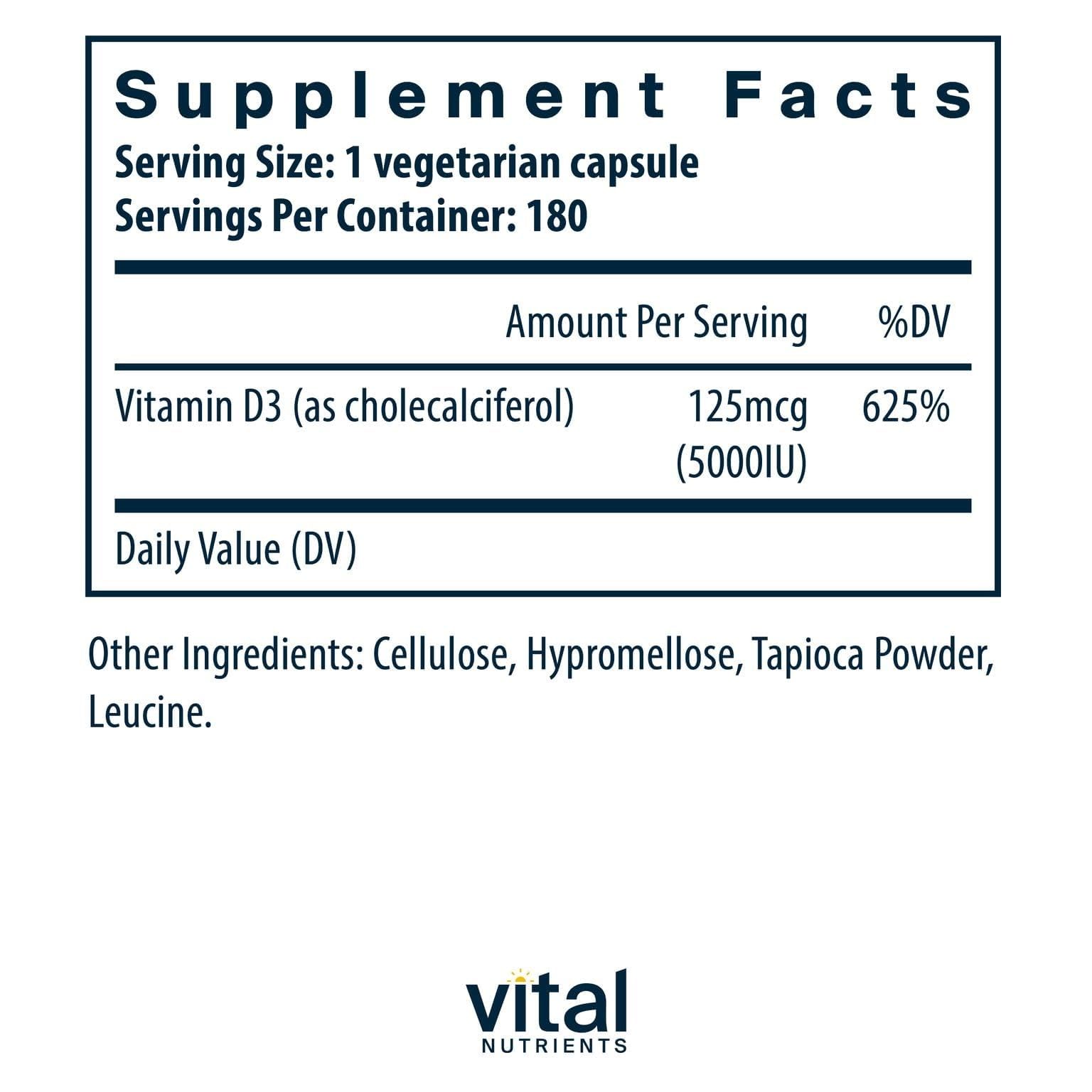 Close-up of Vital Nutrients Vitamin D 5000 IU capsules, easy-to-swallow design.