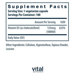 Close-up of Vital Nutrients Vitamin D 5000 IU capsules, easy-to-swallow design.