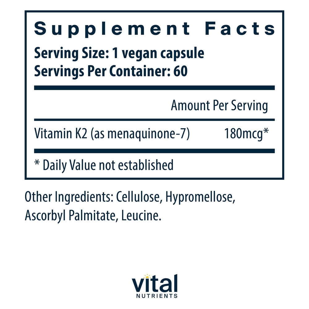 Closeup of Vital Nutrients K2-7 bottle highlighting vegan MK7 capsule for heart health.