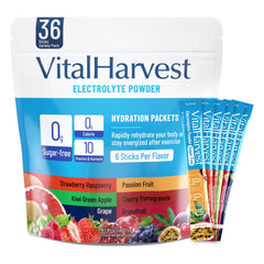 VitalHarvest electrolyte packets in strawberry raspberry being mixed for quick hydration