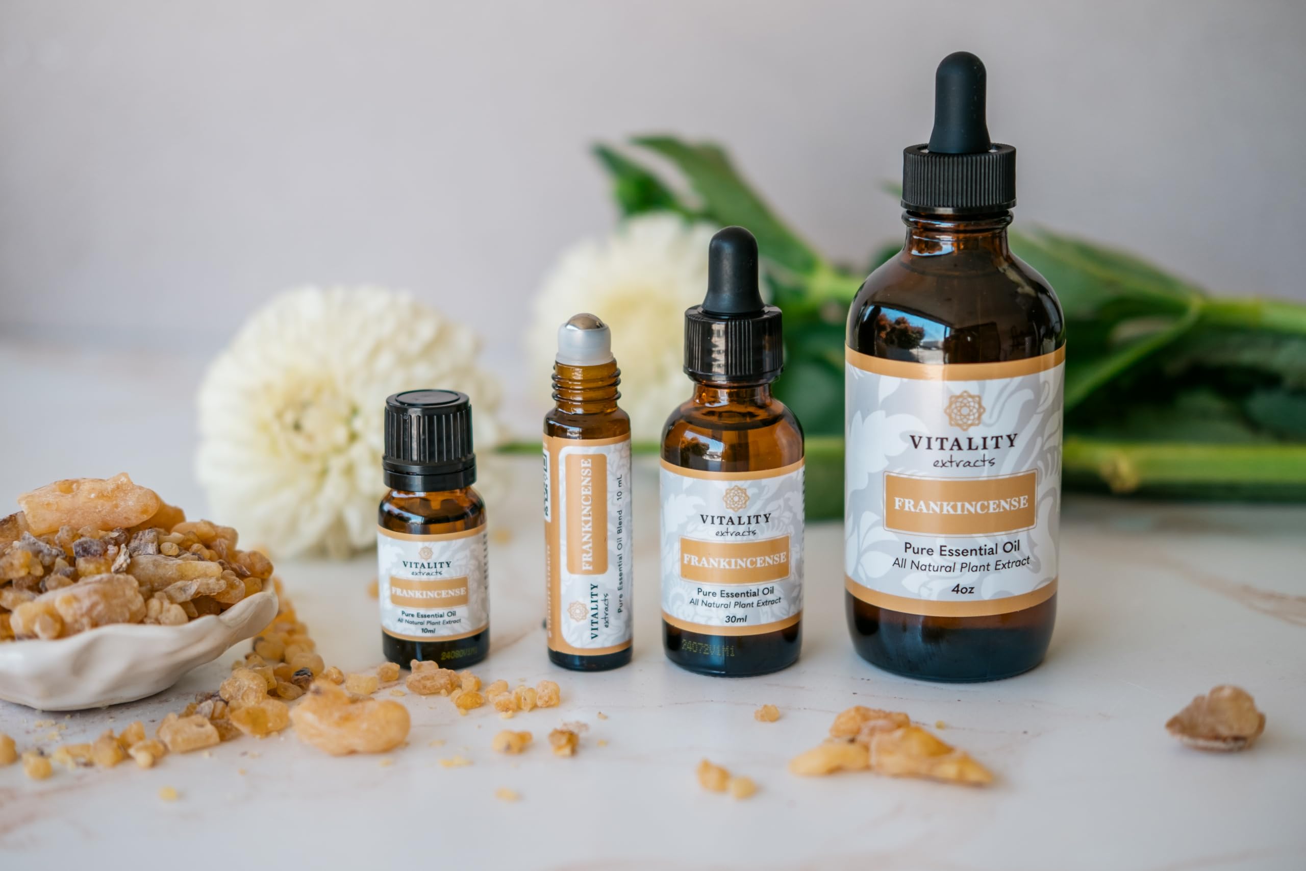 Vitality Frankincense roll-on applied to pulse points for convenience