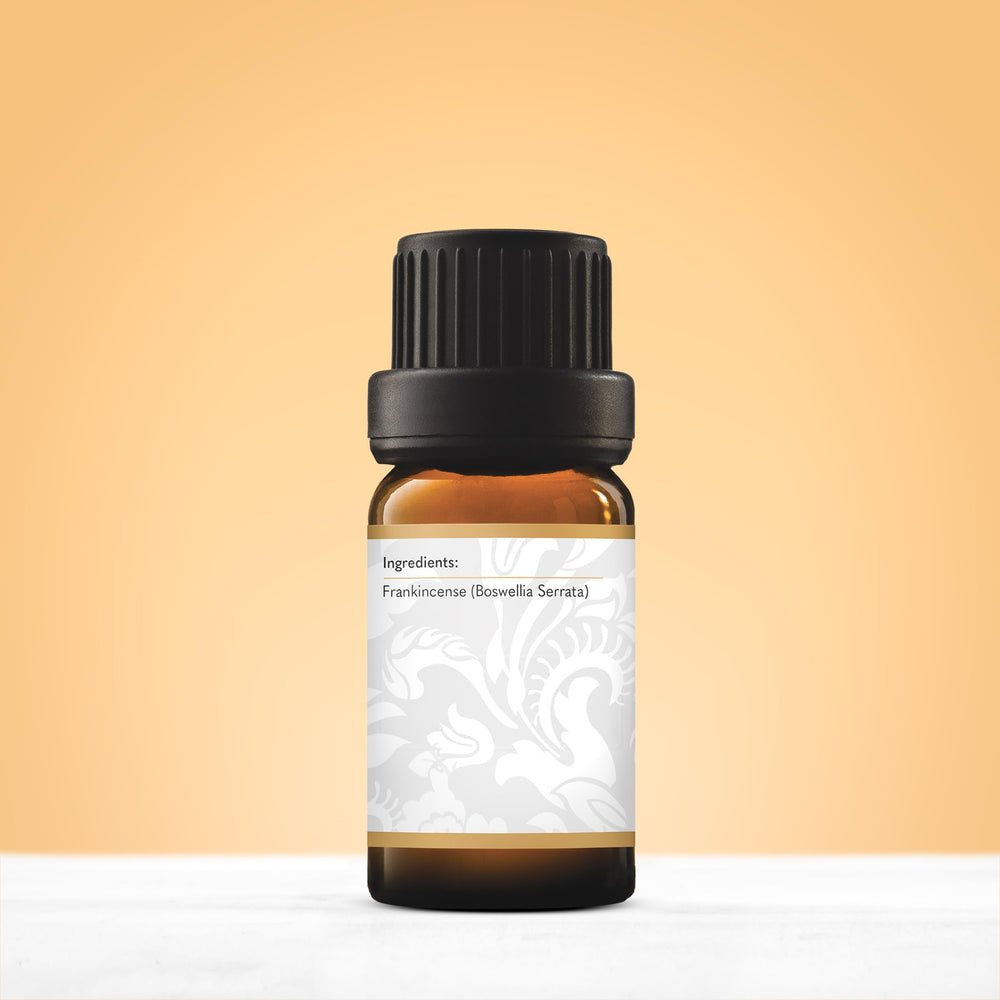 Vitality Frankincense Essential Oil diffuser mist in a serene room.