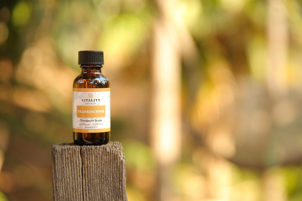 Vitality Frankincense soft lighting and bottle showcase natural mood.
