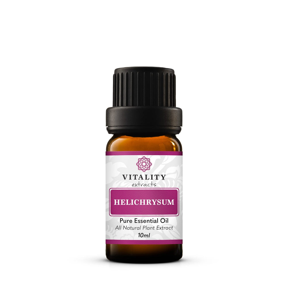 Vitality Helichrysum essential oil bottle pour for skin care and aromatherapy.
