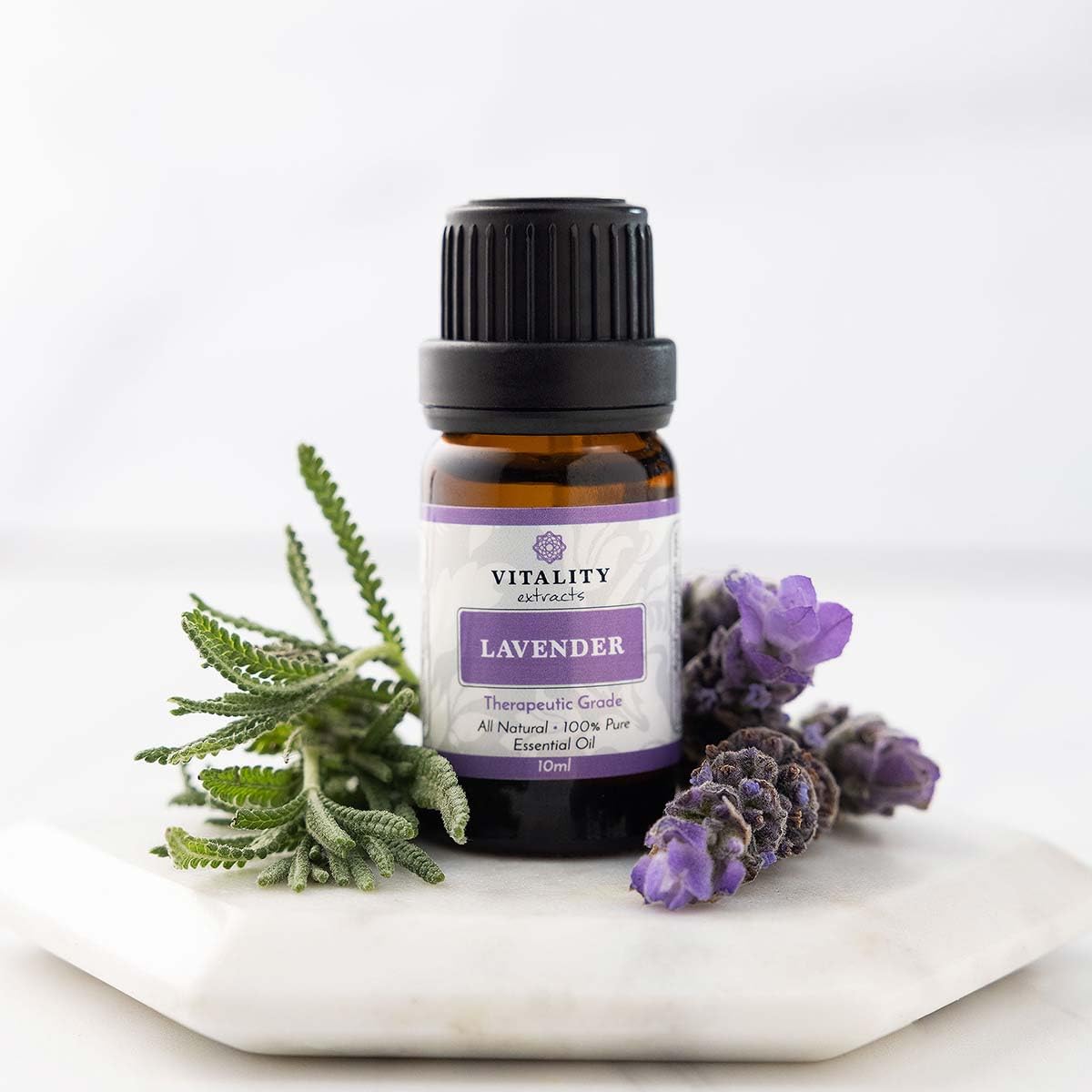 Vitality Lavender oil dropper showing topical application routine