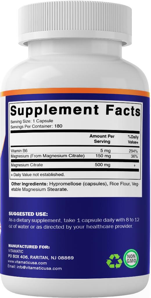 Vitamatic magnesium citrate capsules beside a glass of water for daily use