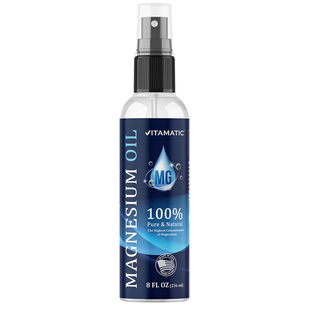 Vitamatic Pure Magnesium Oil Spray bottle in hand for quick muscle relief.