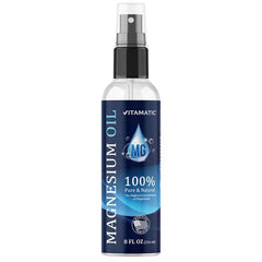 Vitamatic Pure Magnesium Oil Spray bottle in hand for quick muscle relief.