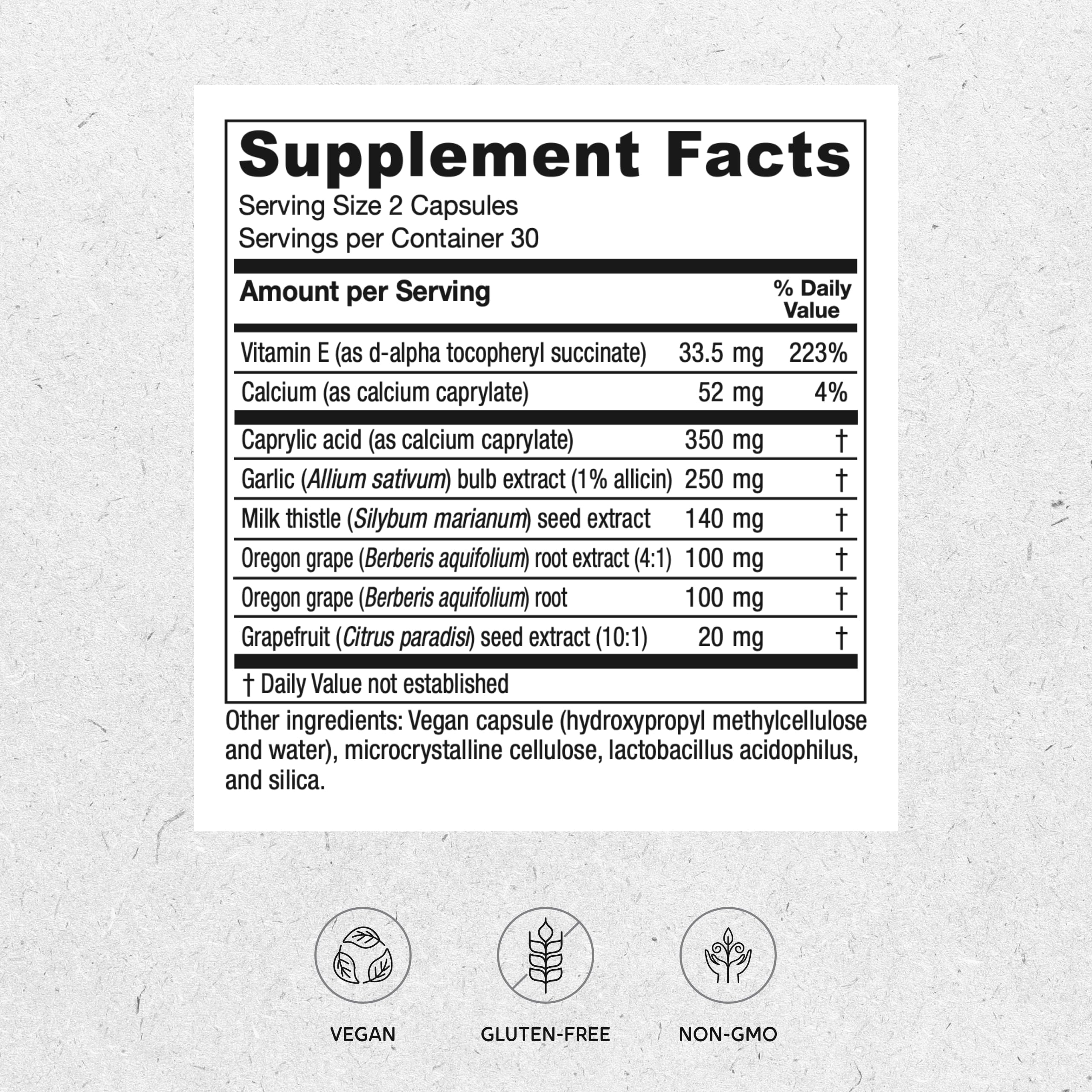 Vitanica Candidastat bottle on wooden surface for natural wellness.
