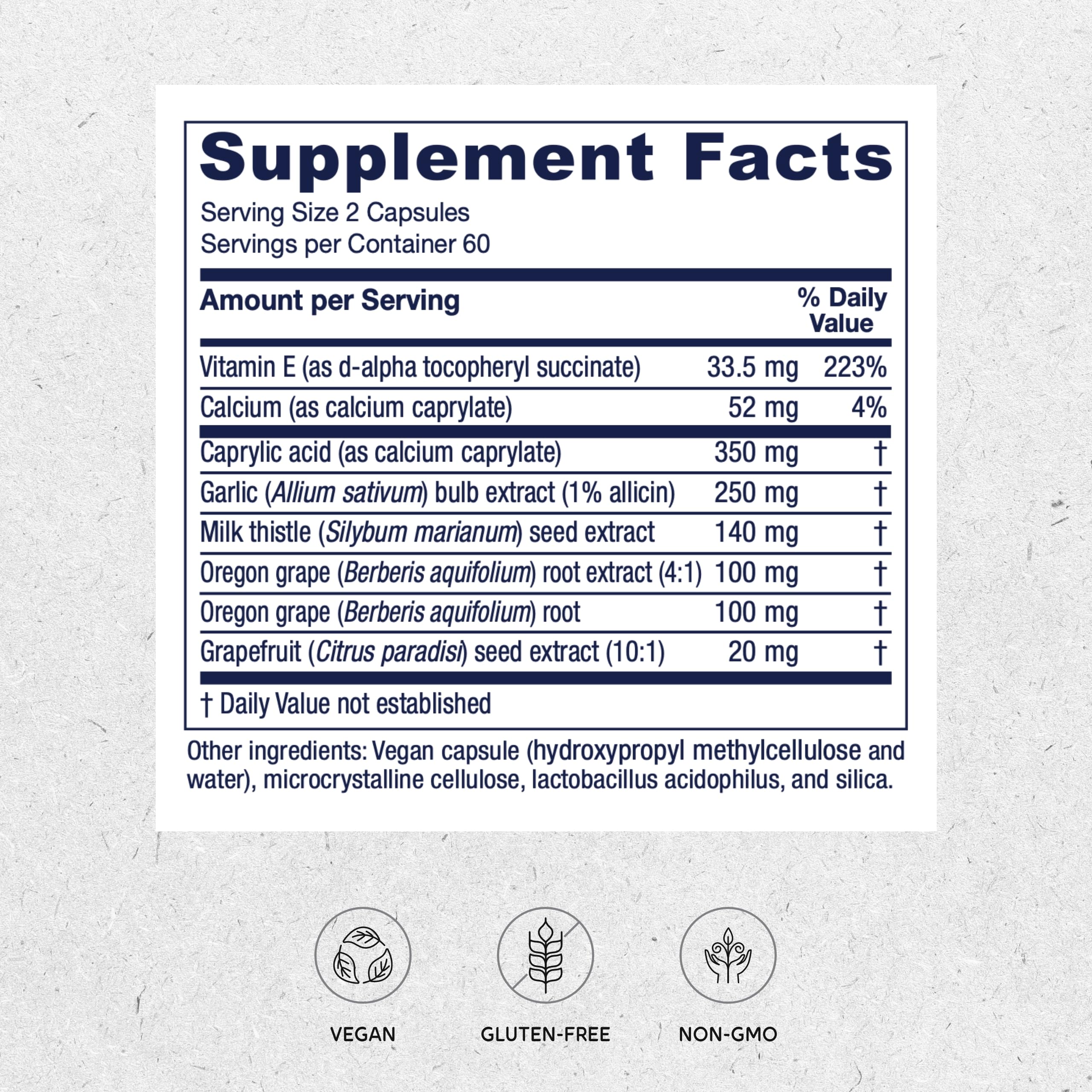 Closeup of Candidastat capsules highlighting a vegan daily dose.
