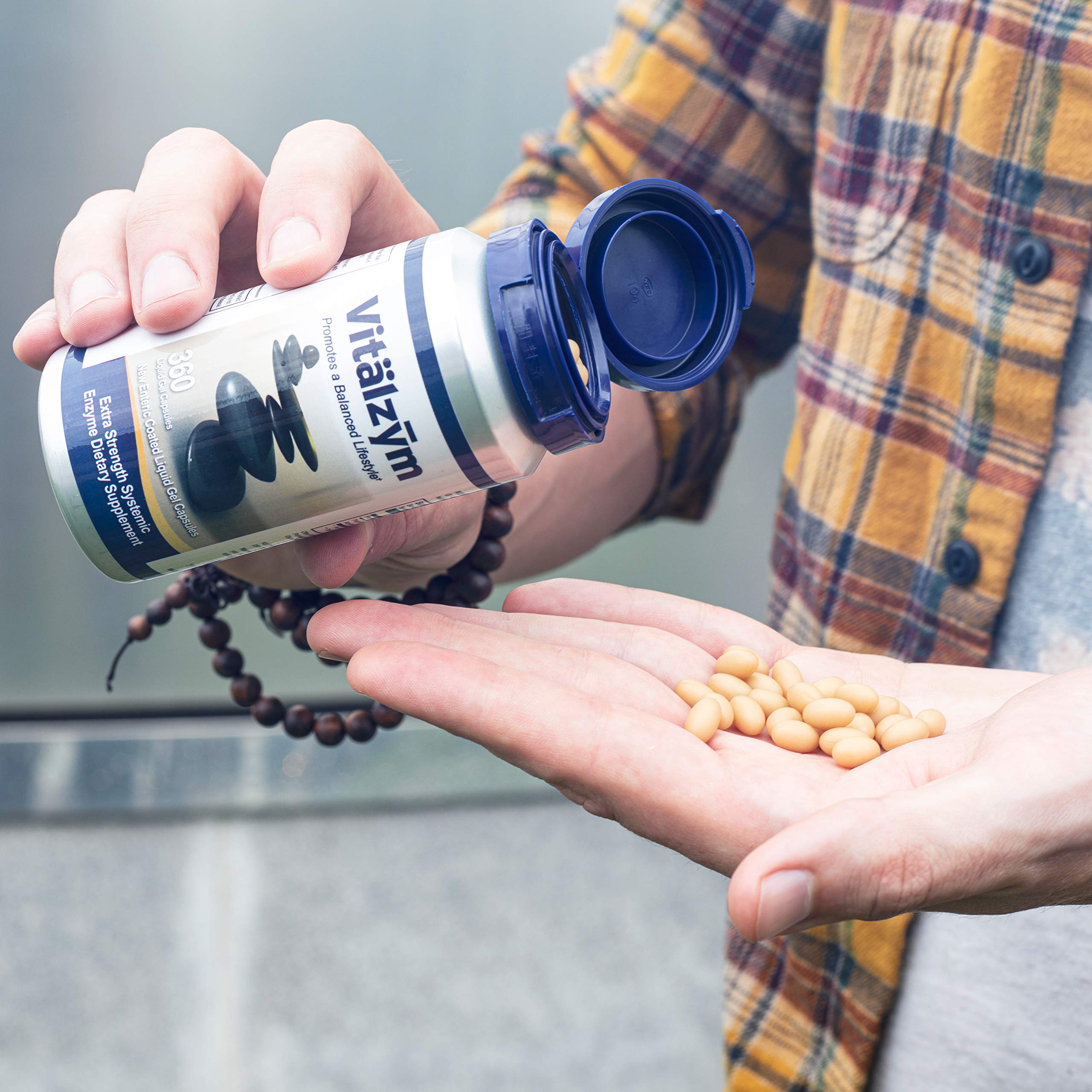VITÄLZYM label highlights vegetarian, gluten-free, dairy-free, yeast-free features.