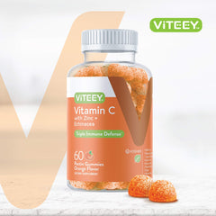 Close-up of Viteey Vitamin C Gummies showing chewy orange texture.