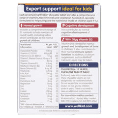 Close-up of Wellkid chewable tablets with fruity flavor hints, easy to chew for kids.