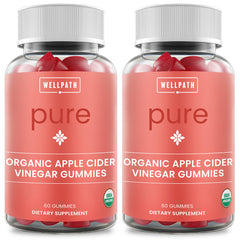 WellPath Pure ACV Gummies two bottles on table for convenient daily use.