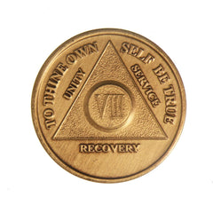 Wendells 8-year AA bronze medallion—front view, a daily sobriety reminder.