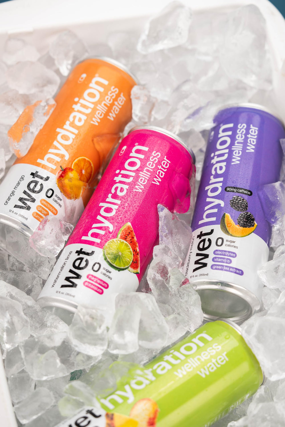 Wet Hydration glass with can showcases flavor and easy hydration on the move.